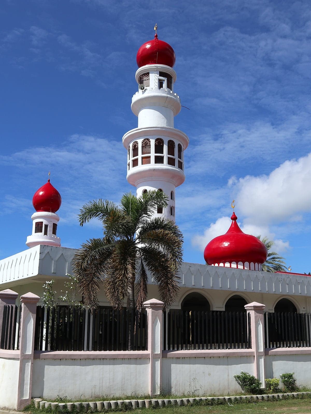 The minaret and red domes of Taluksangay Mosque in Zamboanga City, Mindanao, Philippines